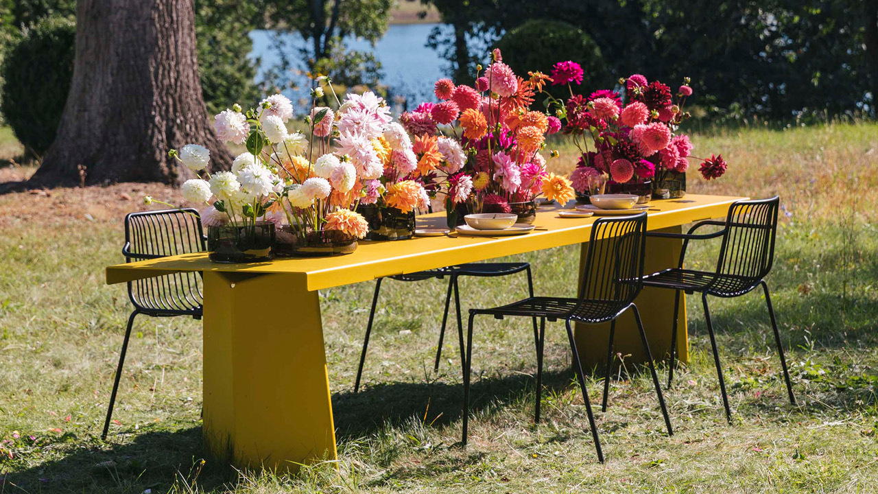 Classi Con outdoor pallas table yellow flowers photo nicholas hagele